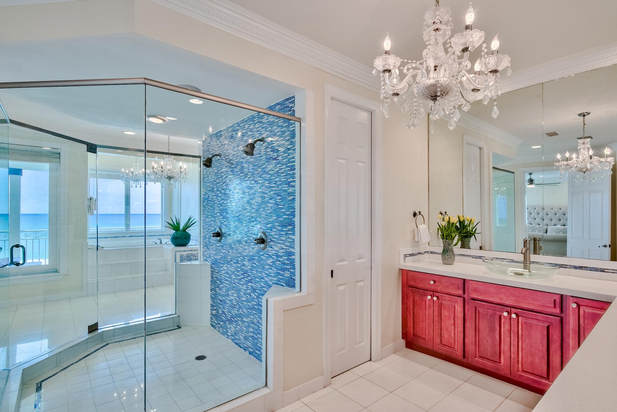 114 Sandprint Circle Destin, FL 32541 - Photo 28 of 57 a bathroom with a shower a sink and mirror