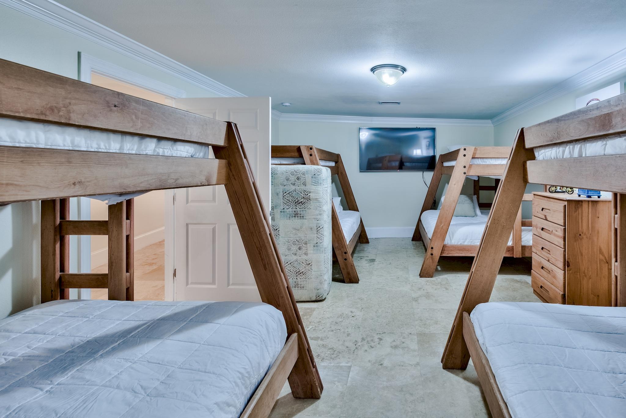 114 Sandprint Circle Destin, FL 32541 - Photo 45 of 57 a bed room with furniture and gym equipment