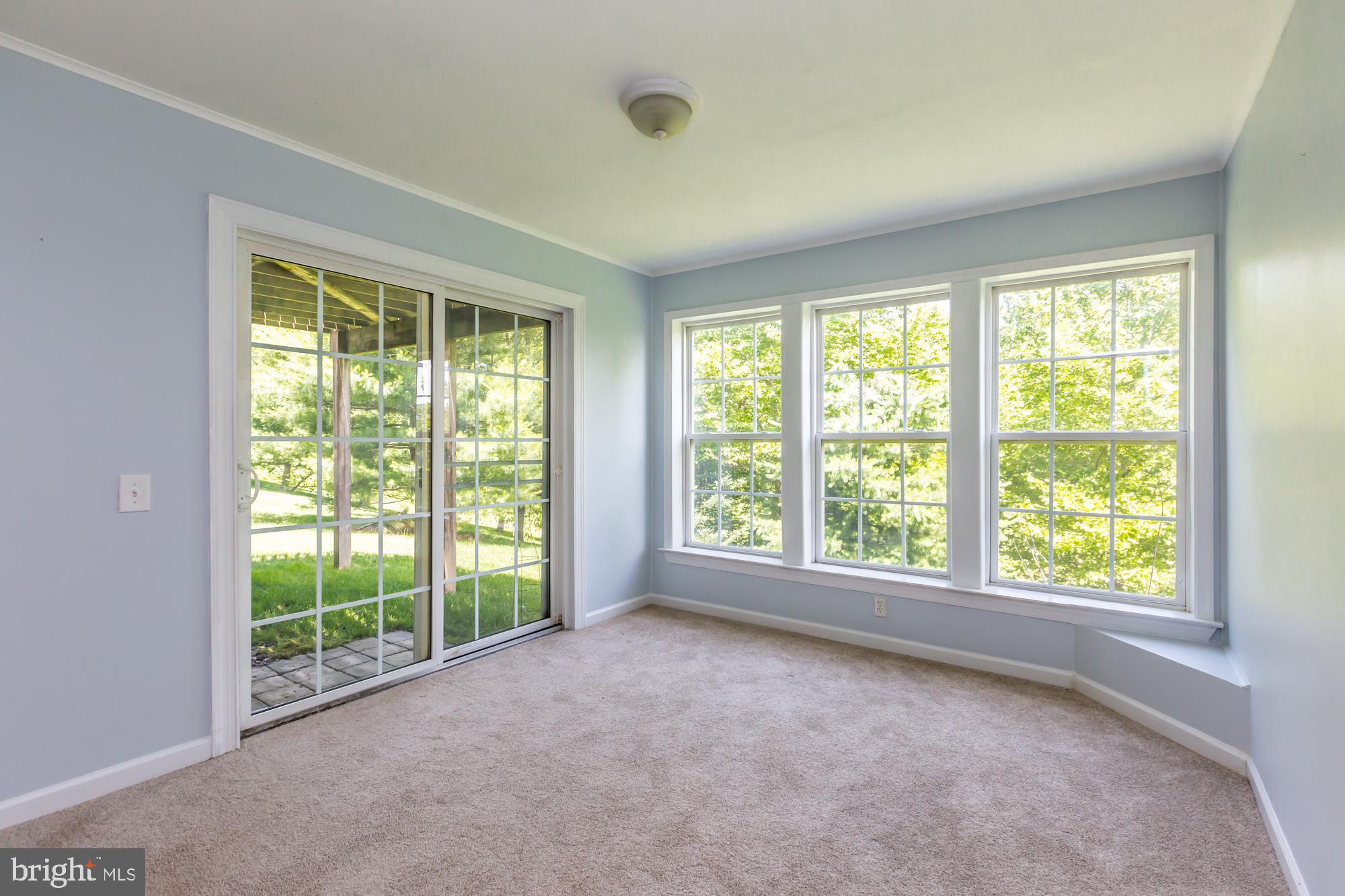 606 Churchill Road Chester Springs, PA 19425 - Photo 25 of 31 Lower Great Room with daylight windows