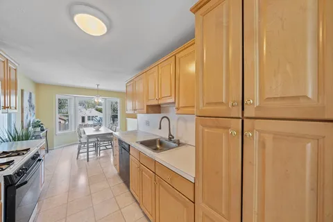 a kitchen with sink cabinets and counter space