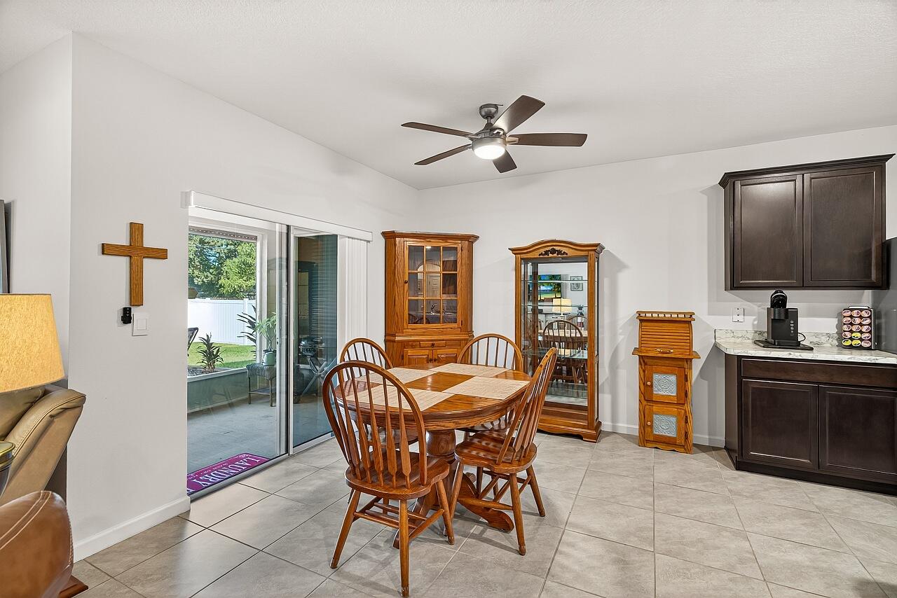 105 Cardinal Drive Sebastian, FL 32958 - Photo 18 of 45 a dining room with furniture and window