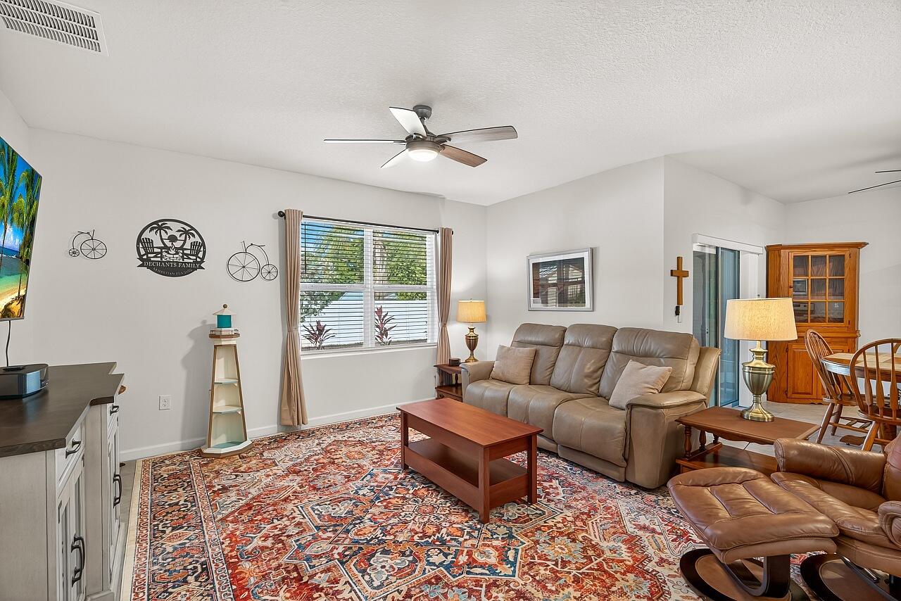 105 Cardinal Drive Sebastian, FL 32958 - Photo 22 of 45 a living room with furniture and a window