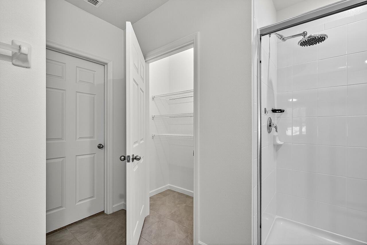 105 Cardinal Drive Sebastian, FL 32958 - Photo 29 of 45 a bathroom with a shower