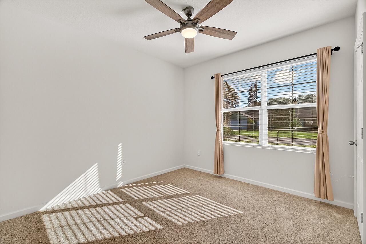 105 Cardinal Drive Sebastian, FL 32958 - Photo 32 of 45 a view of an empty room with a window