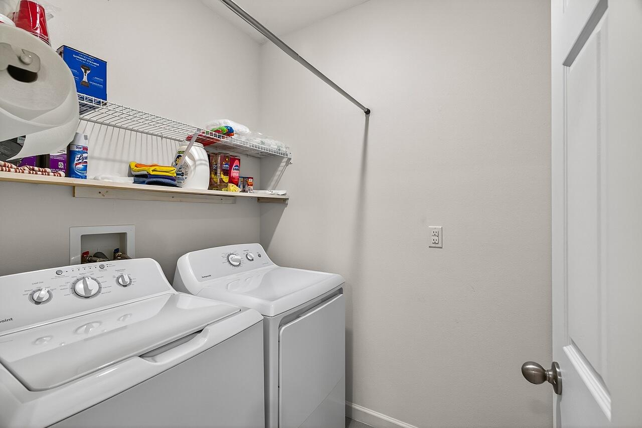 105 Cardinal Drive Sebastian, FL 32958 - Photo 36 of 45 a utility room with dryer and washer