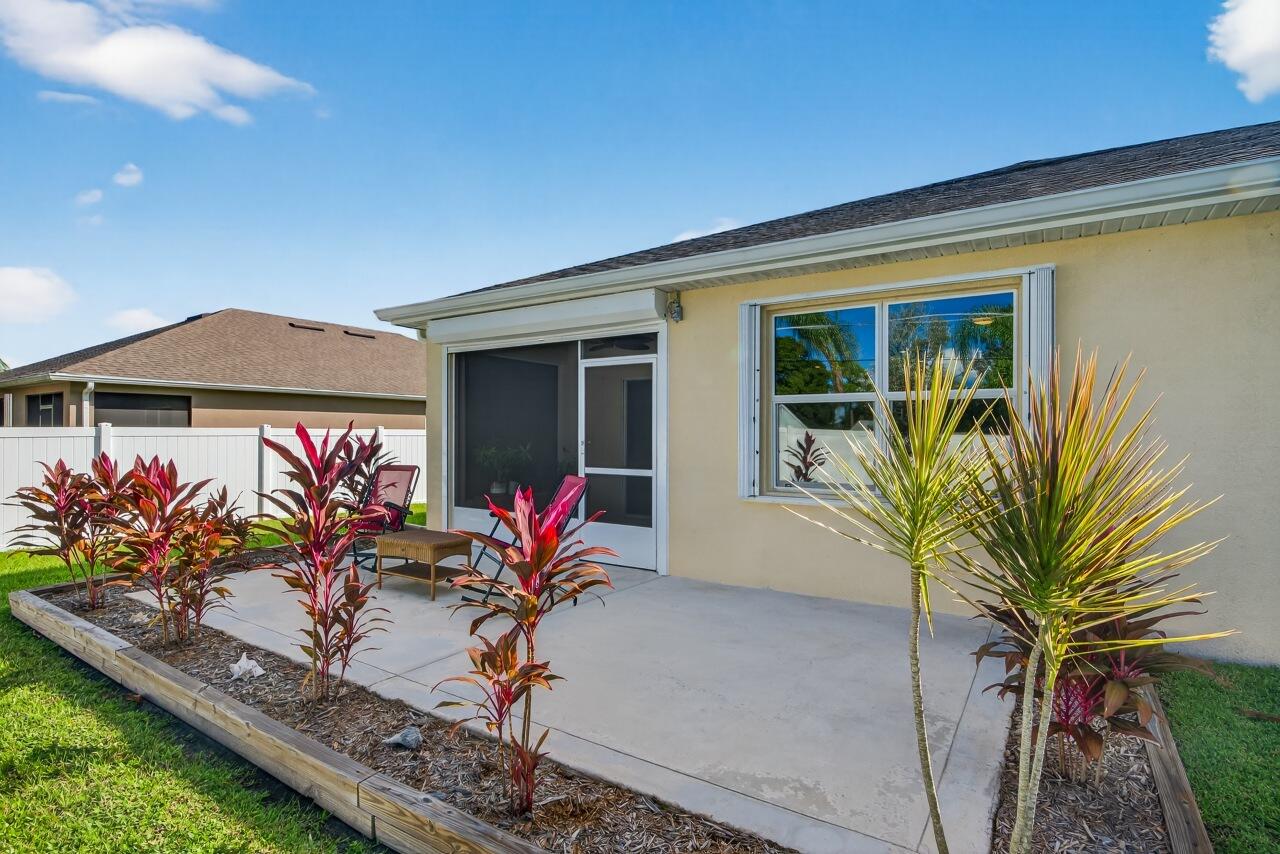 105 Cardinal Drive Sebastian, FL 32958 - Photo 41 of 45 front view of a house with a potted plant