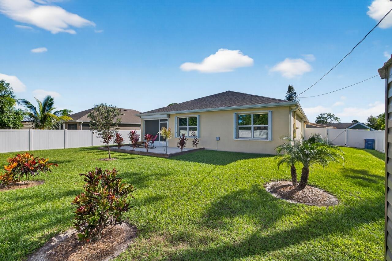 105 Cardinal Drive Sebastian, FL 32958 - Photo 43 of 45 a view of an house with backyard space and balcony