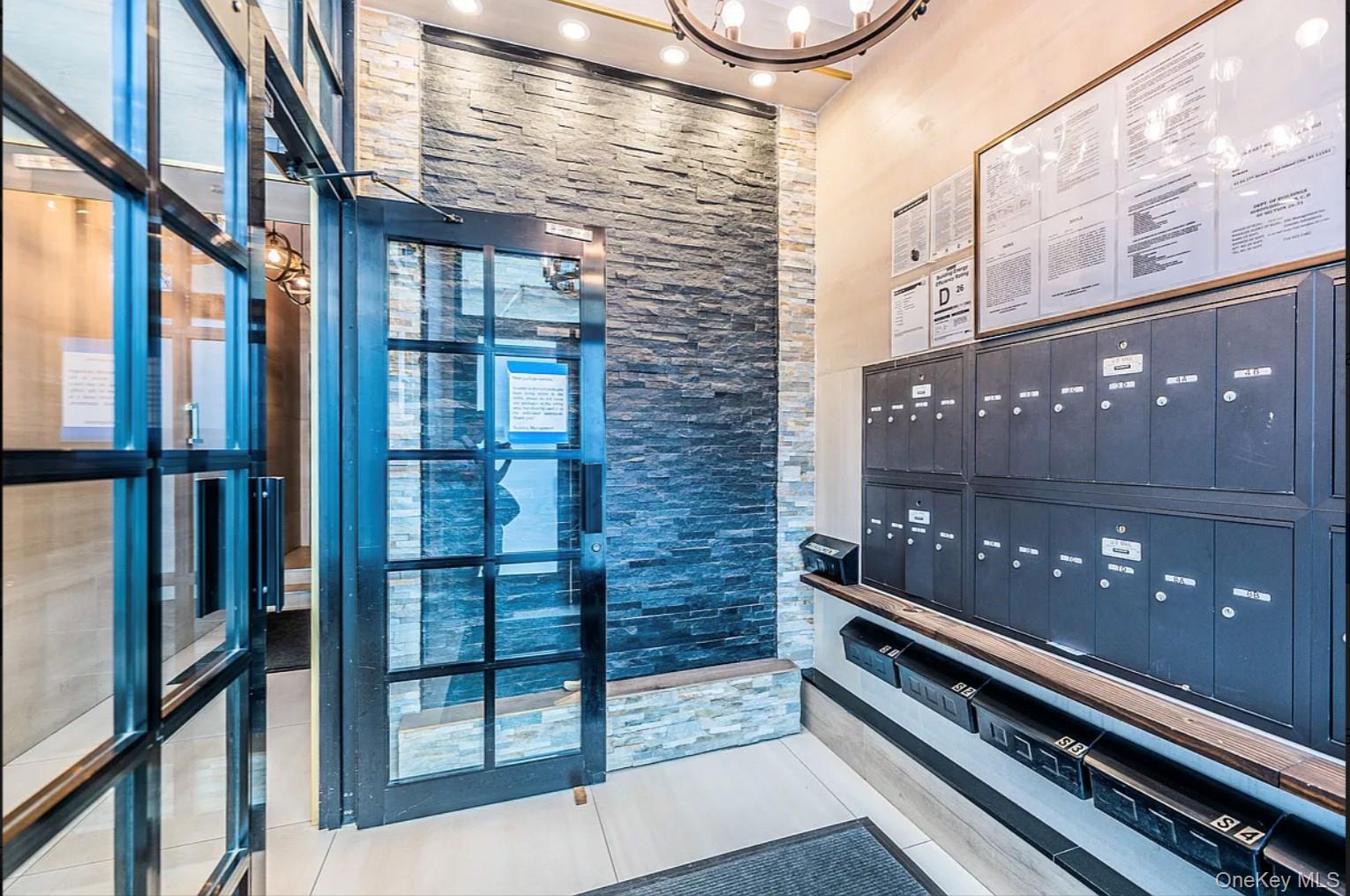 41-04 27th Street, Unit 9A Queens, NY 11101 - Photo 11 of 14 a outdoor view of a building with traffic signal lights