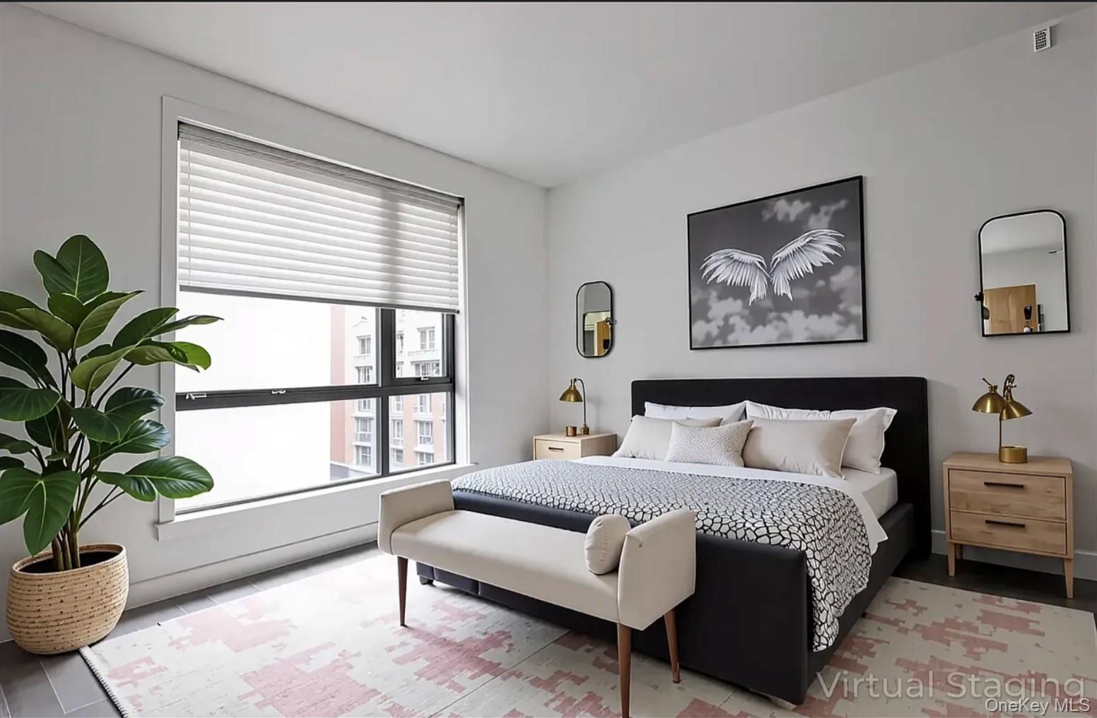 41-04 27th Street, Unit 9A Queens, NY 11101 - Photo 6 of 14 a spacious bedroom with a large bed and a potted plant
