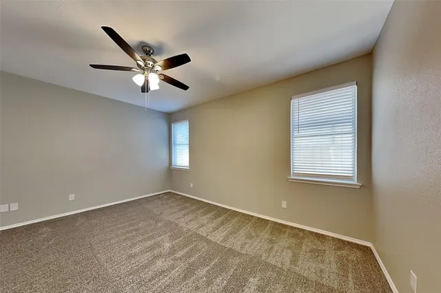 a white bath tub sitting in a bathroom