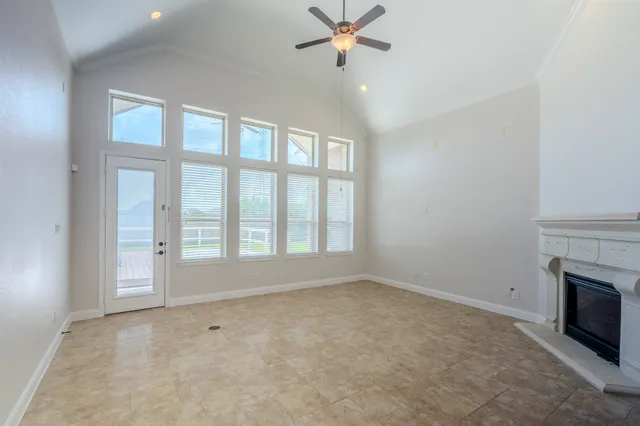 a view of empty room with fan