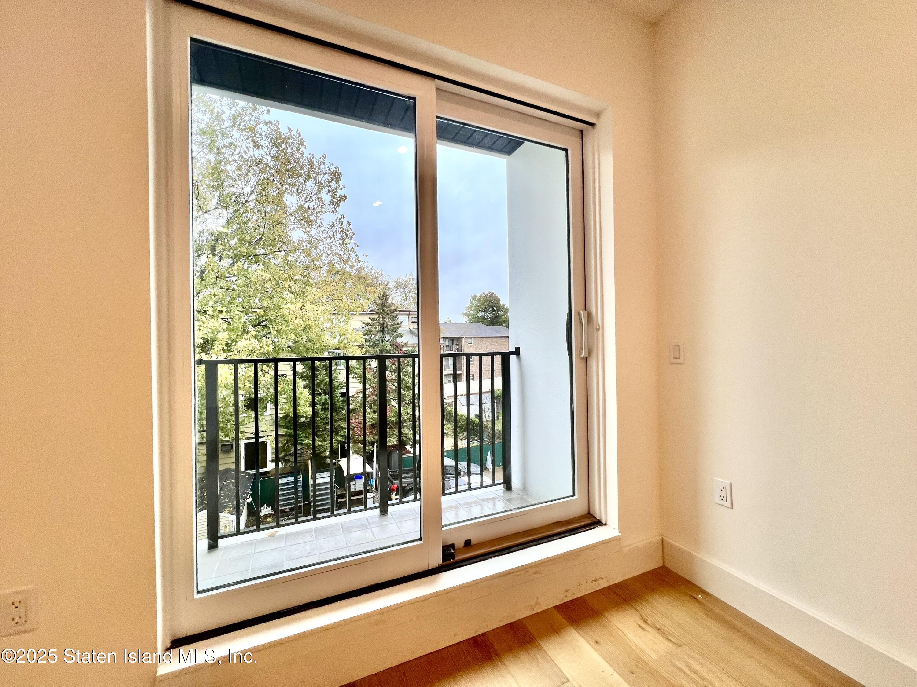 3865 Amboy Road, Unit 4D Staten Island, NY 10308 - Photo 11 of 30 a view of a room that has a large window