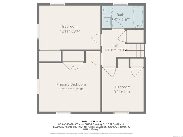 a picture of a bench in front of a wall