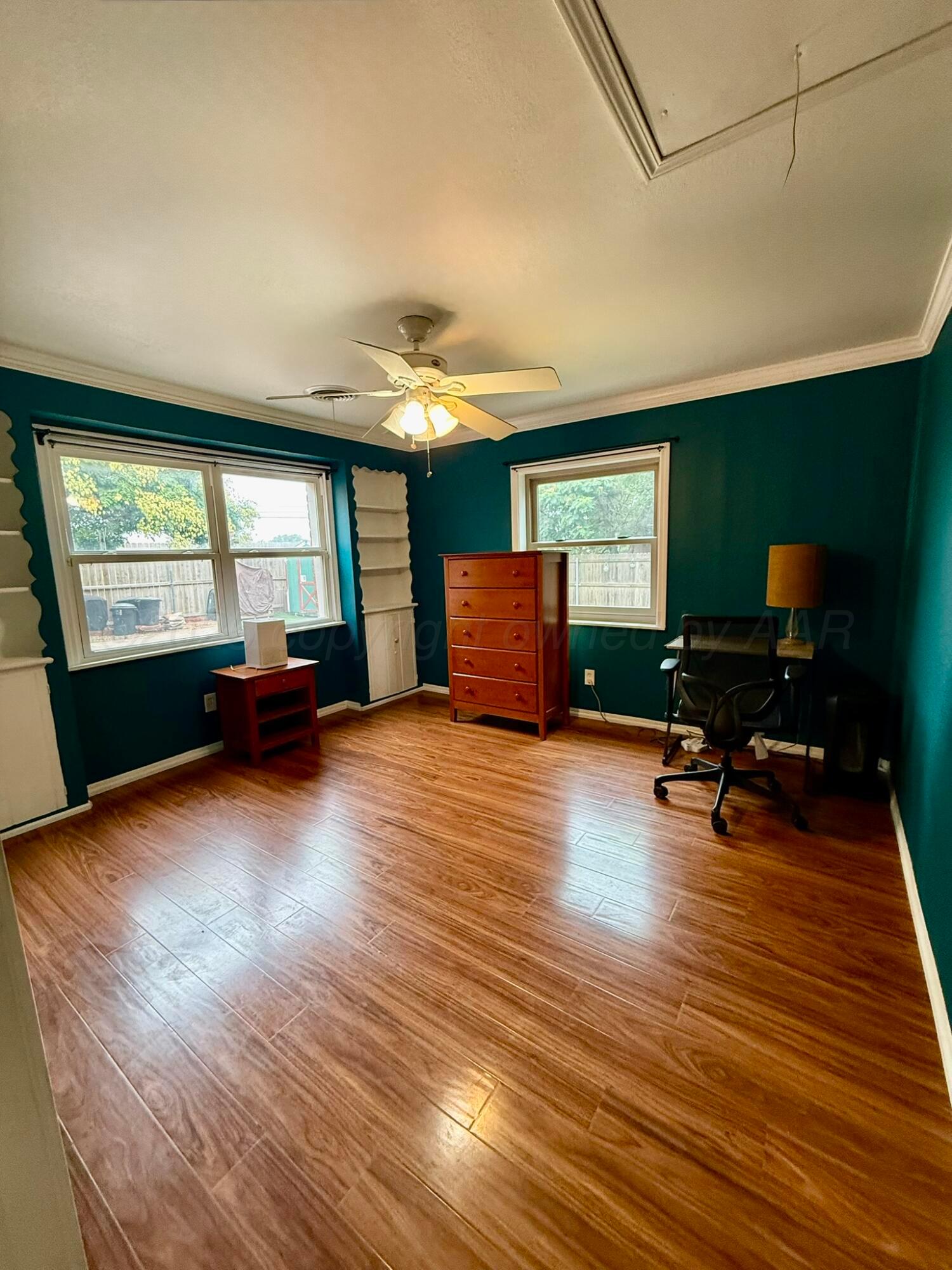 3314 Kingston Road Amarillo, TX 79106 - Photo 11 of 17 a view of a livingroom with furniture a fireplace and wooden floor