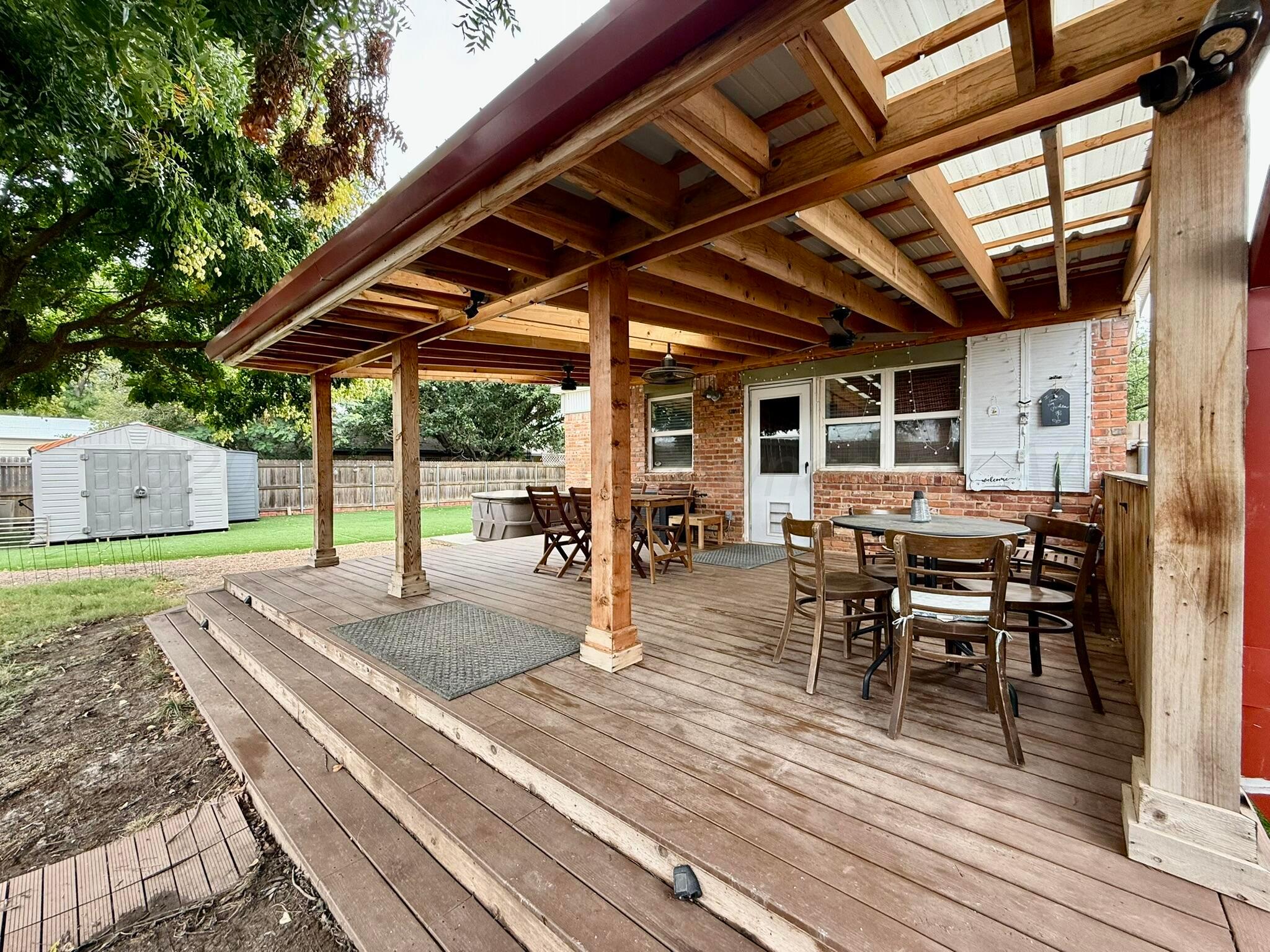 3314 Kingston Road Amarillo, TX 79106 - Photo 15 of 17 a view of a backyard with sitting area