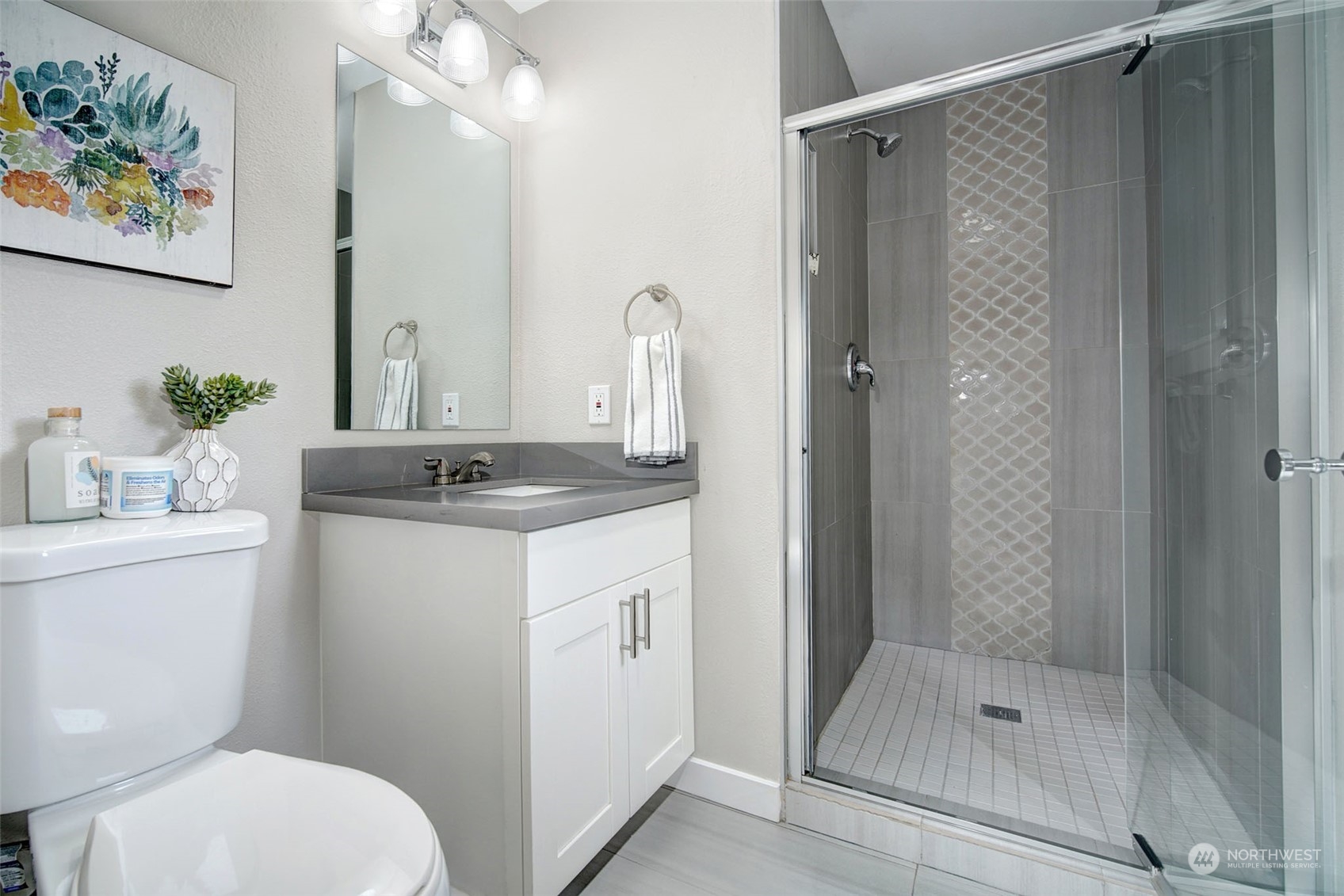 9504 233rd Street Southwest Edmonds, WA 98020 - Photo 14 of 26 a bathroom with a granite countertop sink toilet and shower