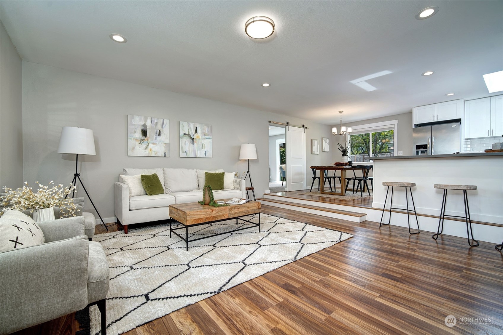 9504 233rd Street Southwest Edmonds, WA 98020 - Photo 2 of 26 a living room with furniture and a wooden floor