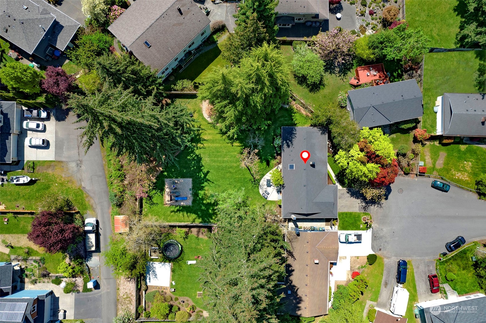 9504 233rd Street Southwest Edmonds, WA 98020 - Photo 25 of 26 an aerial view of a house with a yard and garden