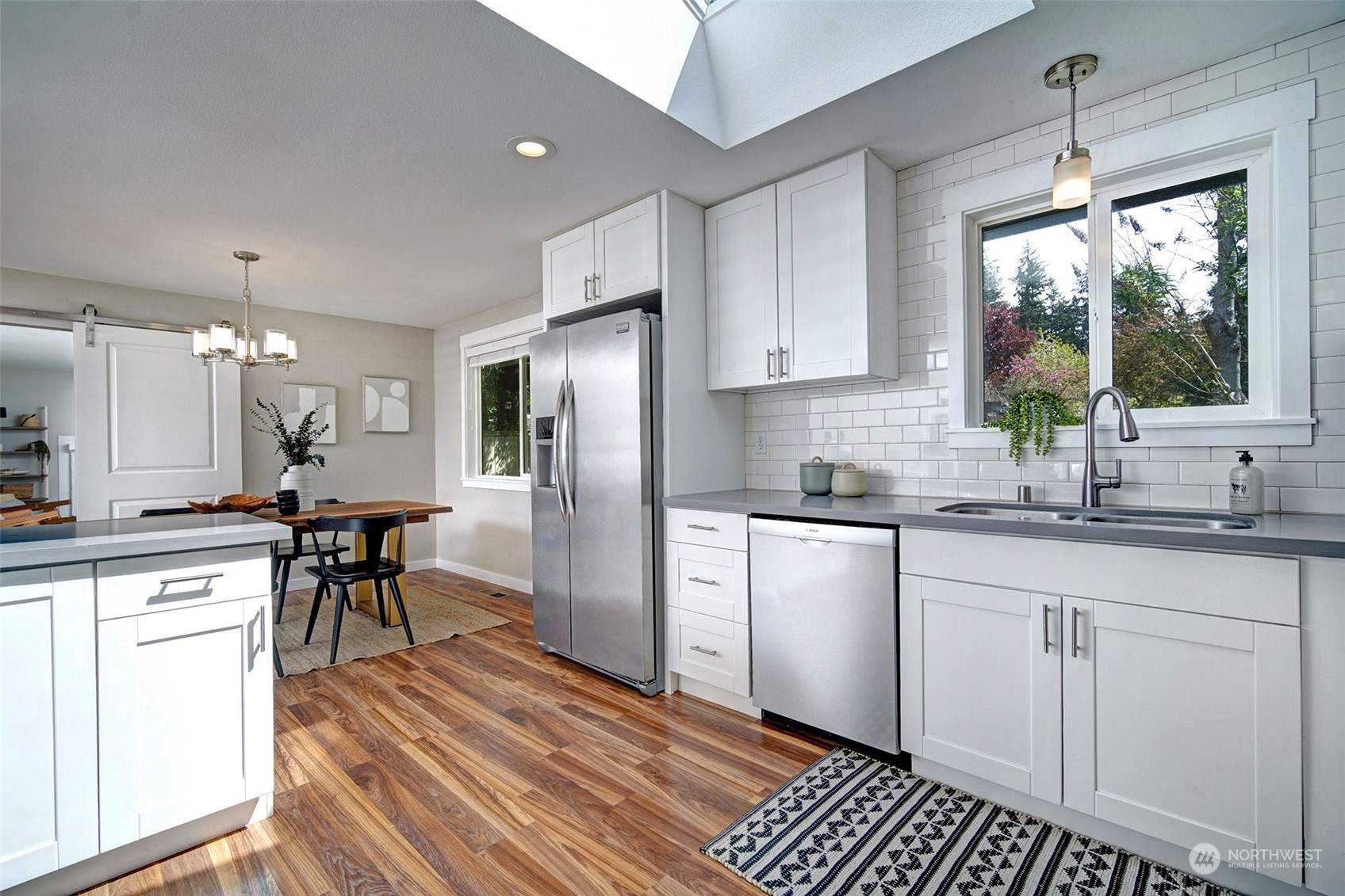 9504 233rd Street Southwest Edmonds, WA 98020 - Photo 6 of 26 a kitchen with a sink stove and refrigerator