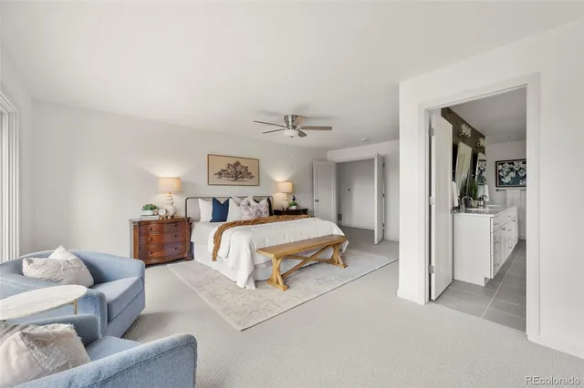 a bedroom with furniture and a couch