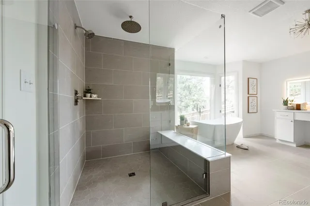 a kitchen with stainless steel appliances a sink stove and cabinets