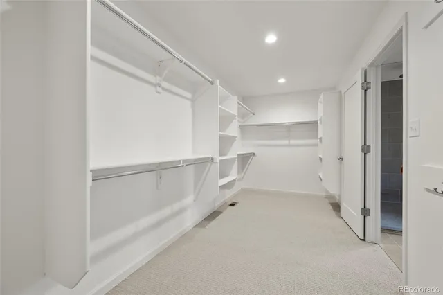 an empty room with a empty space and a window