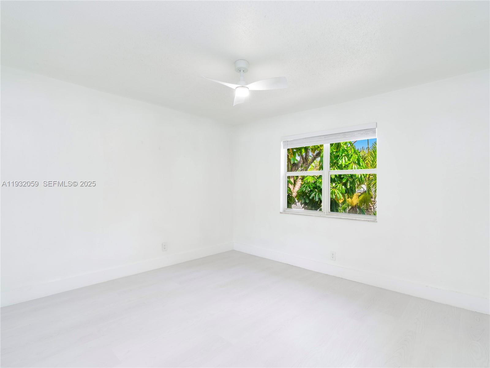 2025 Miami Road, Unit 17 Fort Lauderdale, FL 33316 - Photo 18 of 23 an empty room with a window