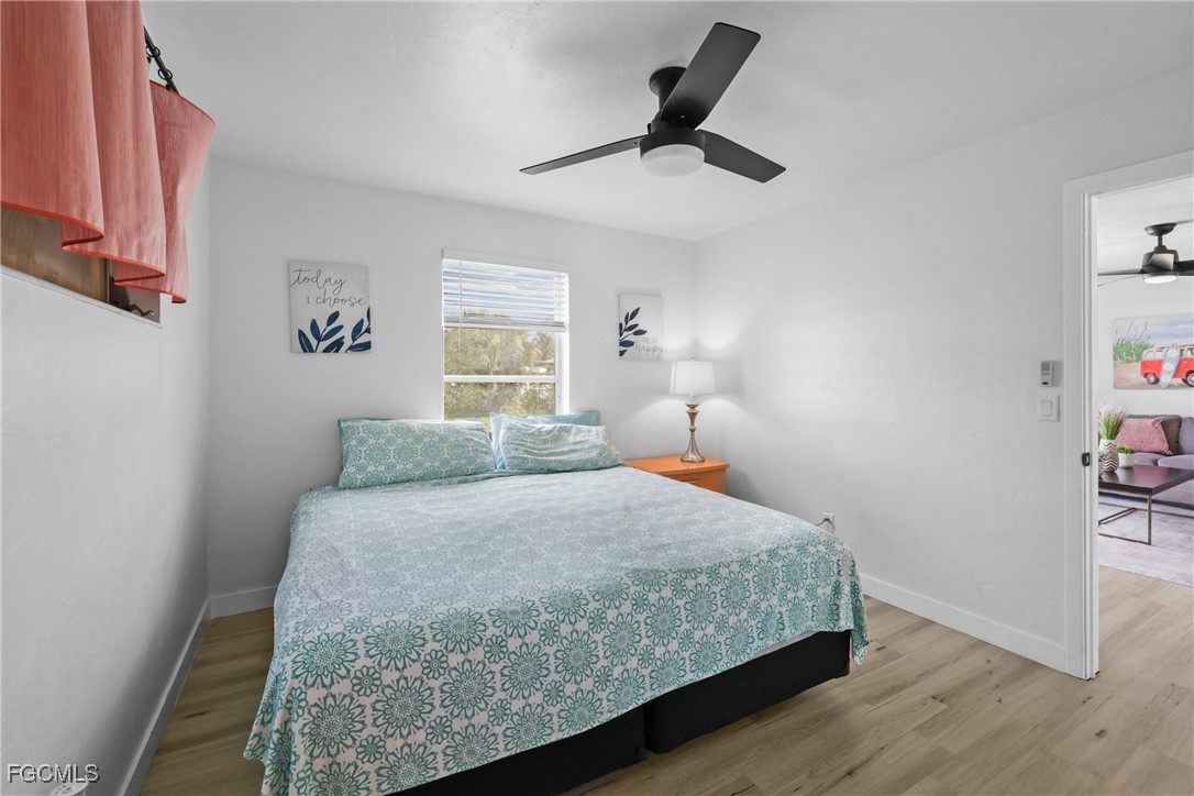 1661 Coronado Road Fort Myers, FL 33901 - Photo 14 of 50 a bedroom with a bed and a window