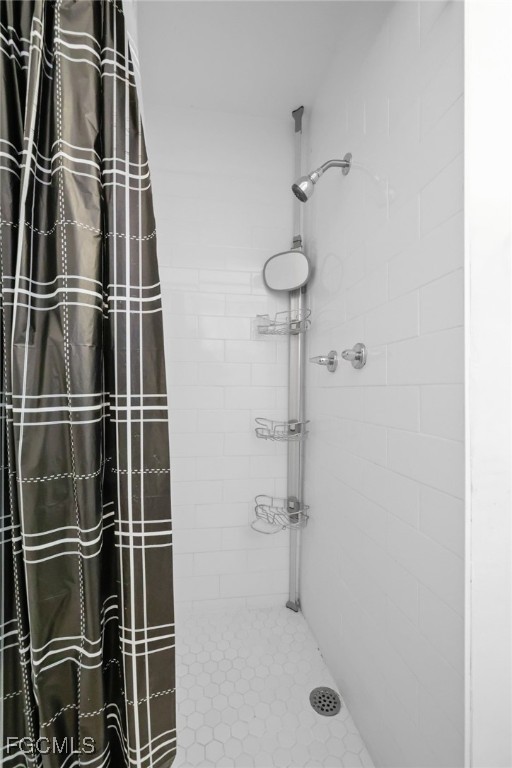 1661 Coronado Road Fort Myers, FL 33901 - Photo 16 of 50 a bathroom with a shower