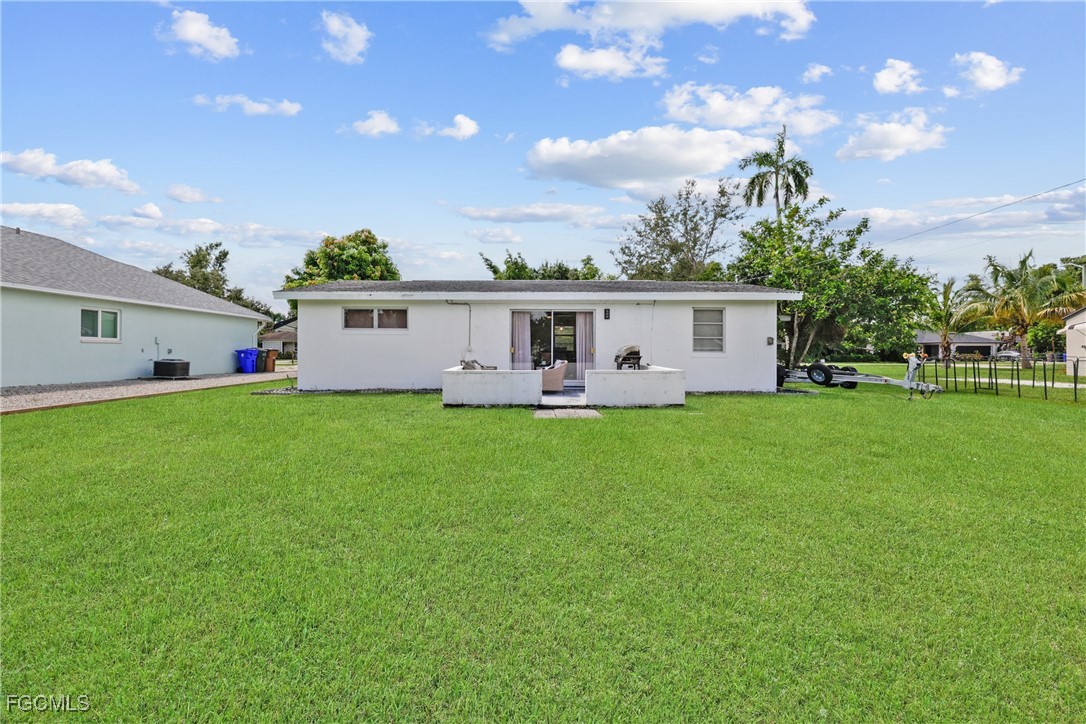 1661 Coronado Road Fort Myers, FL 33901 - Photo 27 of 50 a view of house with backyard