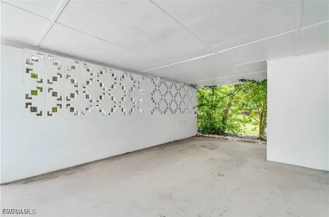 a view of a big room with a large window