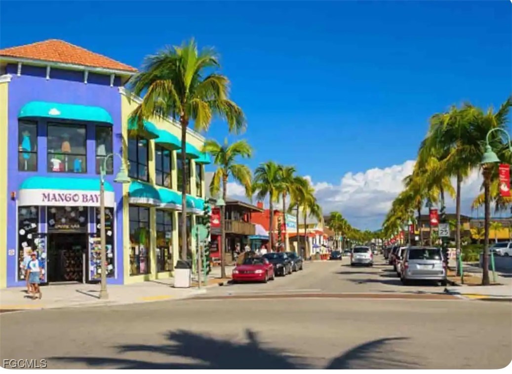 1661 Coronado Road Fort Myers, FL 33901 - Photo 50 of 50 a view of street with shops and palm trees