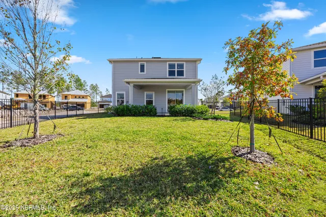 a house view with a garden space