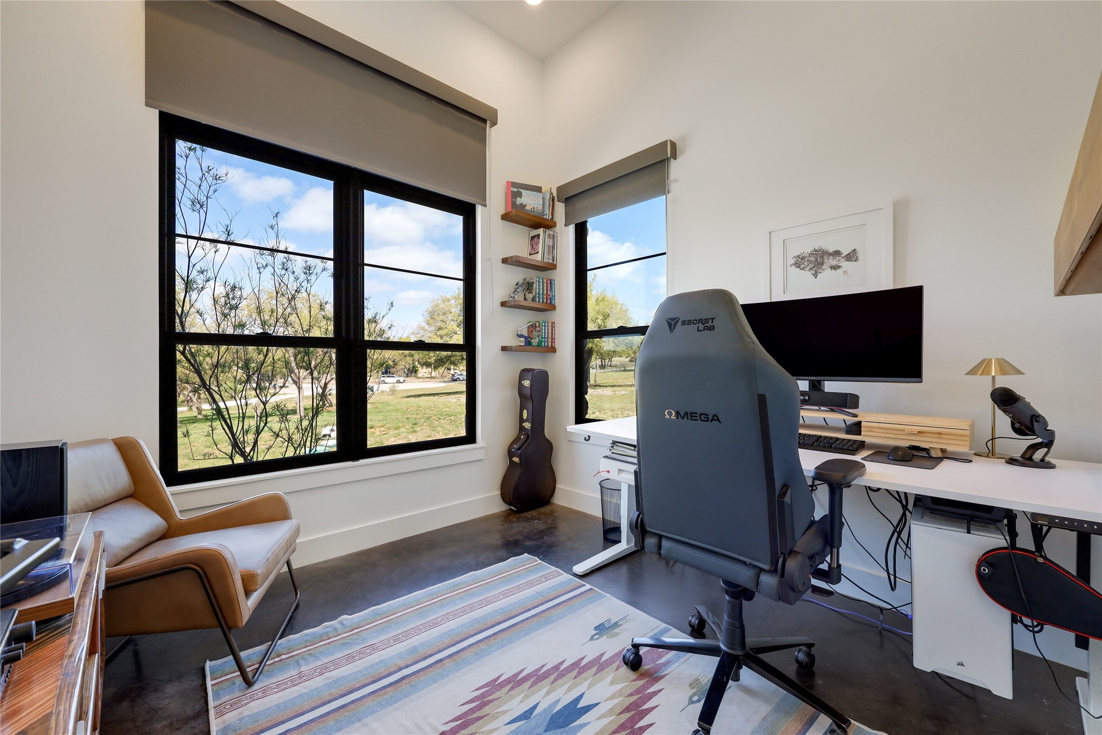 329 Calvary Cove Dripping Springs, TX 78620 - Photo 18 of 40 a view of a workspace with furniture and a window