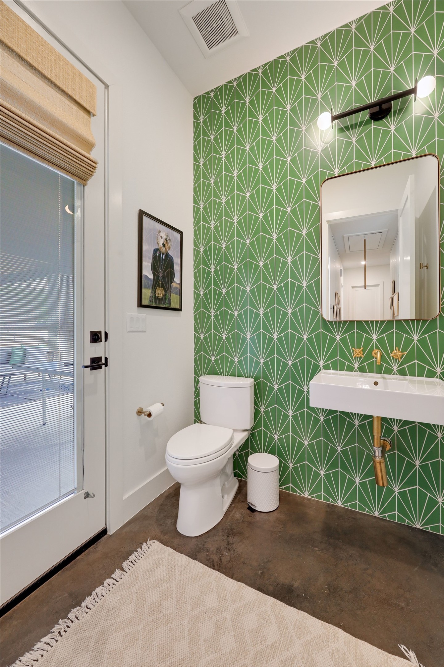 329 Calvary Cove Dripping Springs, TX 78620 - Photo 20 of 40 a bathroom with a toilet and a sink