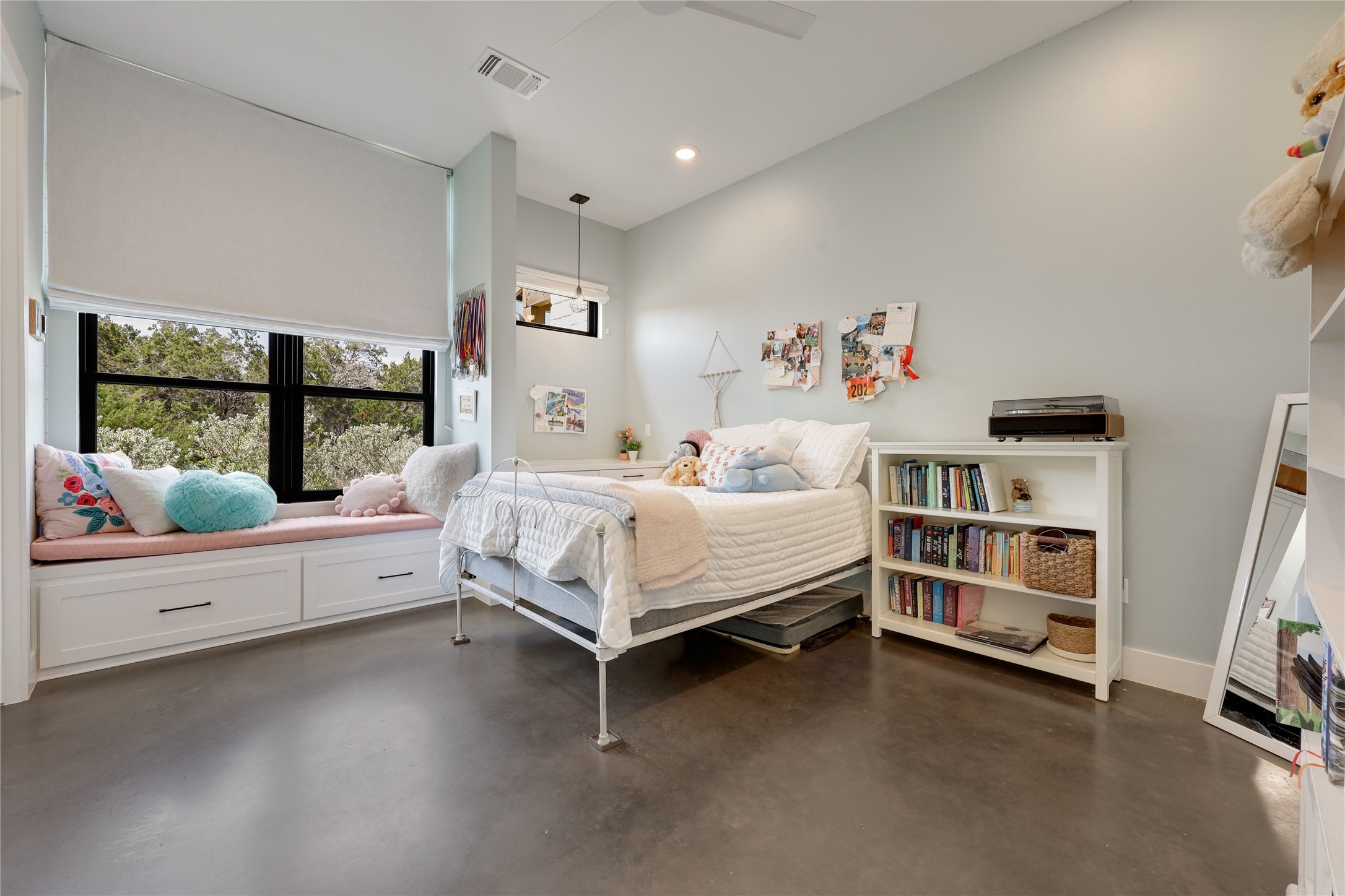 329 Calvary Cove Dripping Springs, TX 78620 - Photo 21 of 40 a bedroom with a bed and a window