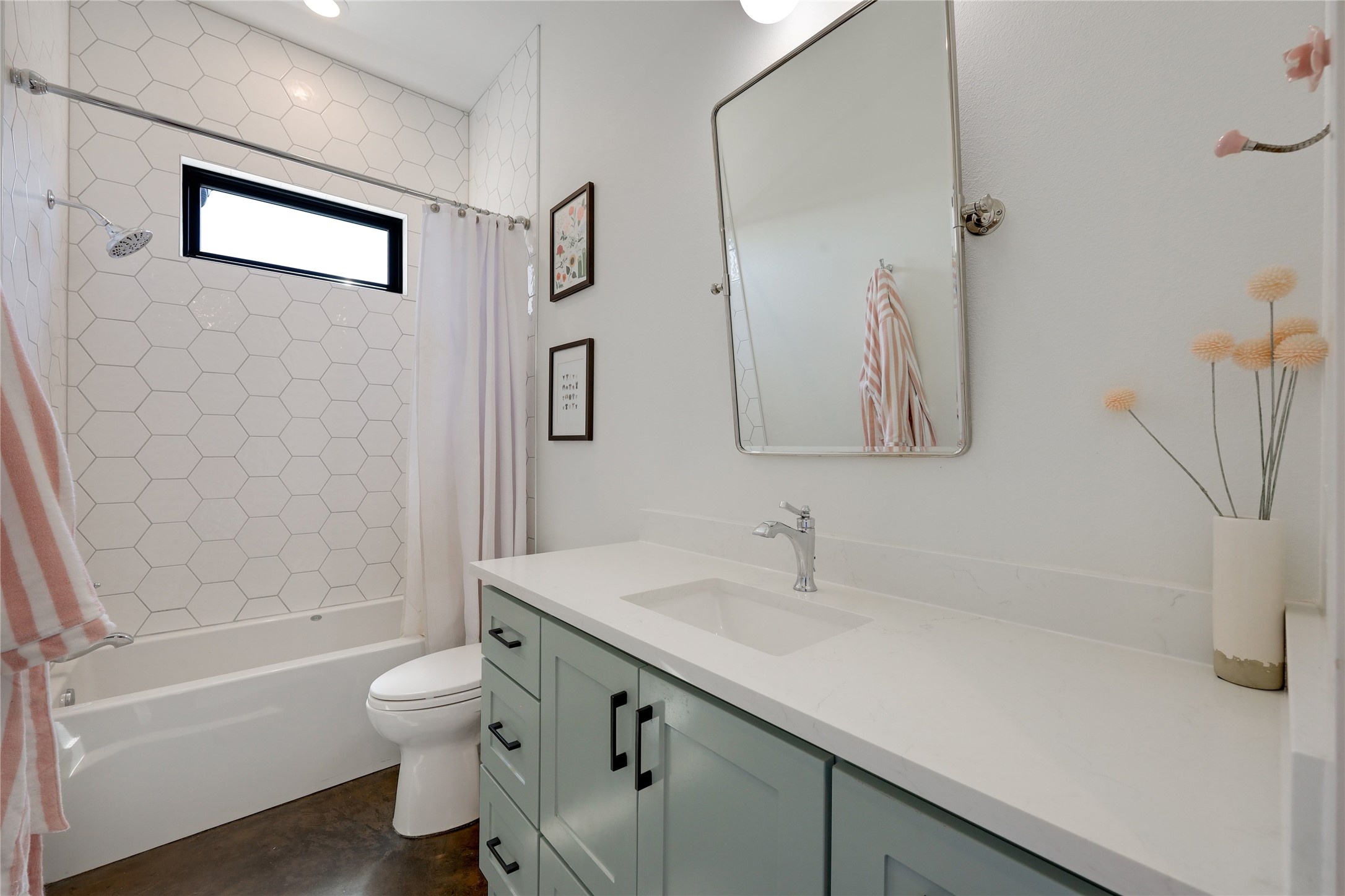 329 Calvary Cove Dripping Springs, TX 78620 - Photo 22 of 40 a bathroom with a sink toilet and shower
