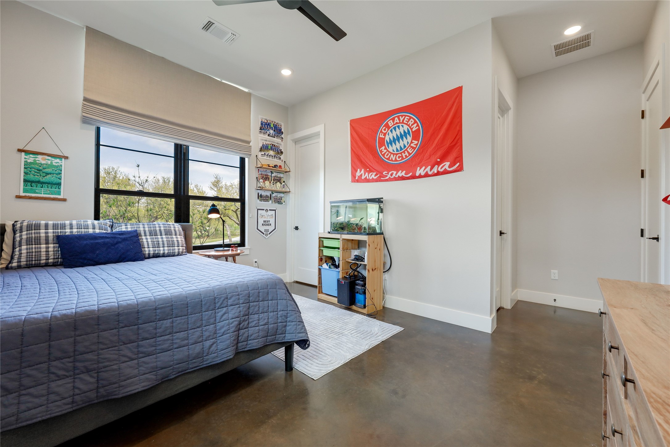 329 Calvary Cove Dripping Springs, TX 78620 - Photo 23 of 40 a bed room with a bed and a couch