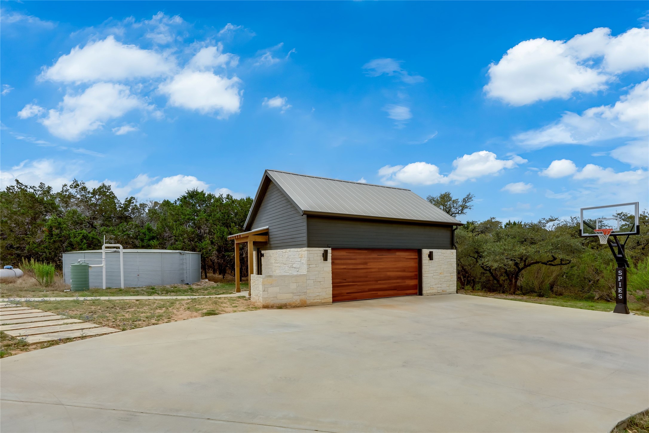 329 Calvary Cove Dripping Springs, TX 78620 - Photo 37 of 40 a front view of a house with a yard