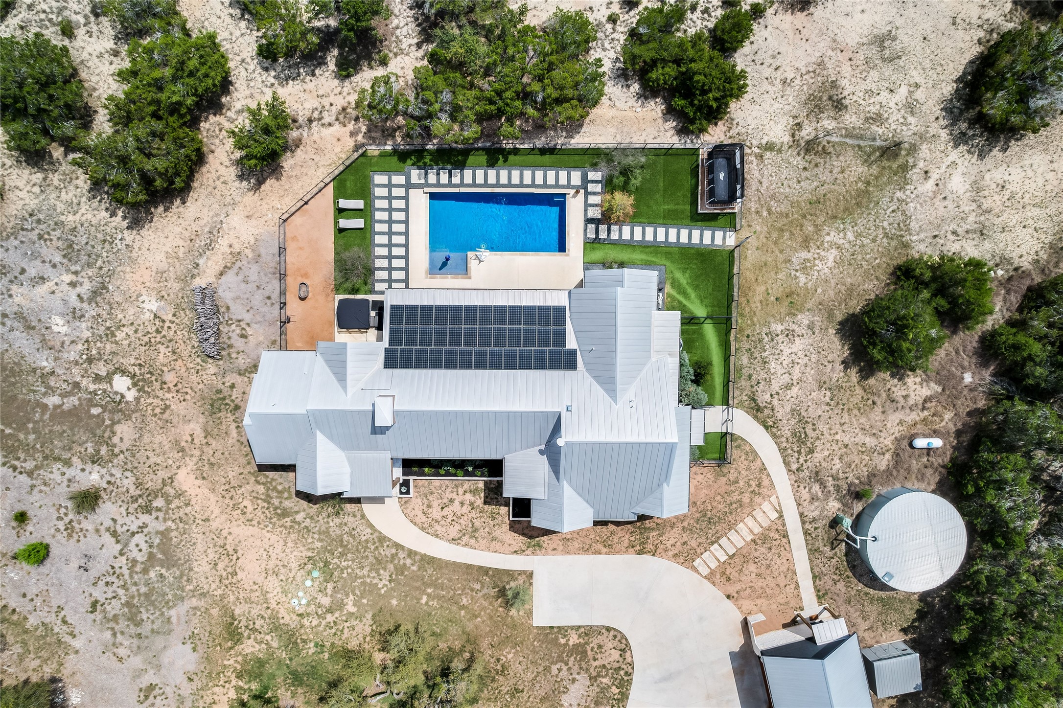 329 Calvary Cove Dripping Springs, TX 78620 - Photo 40 of 40 a balcony with table and chairs