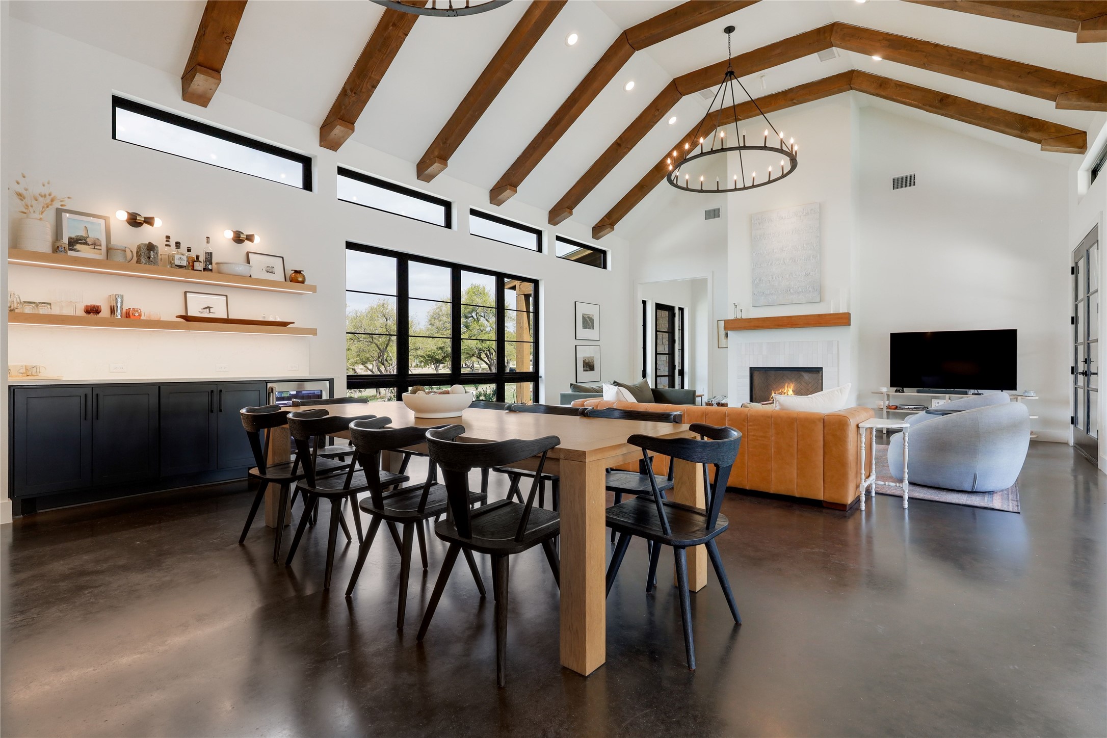 329 Calvary Cove Dripping Springs, TX 78620 - Photo 10 of 40 a view of a dining room with furniture window and wooden floor