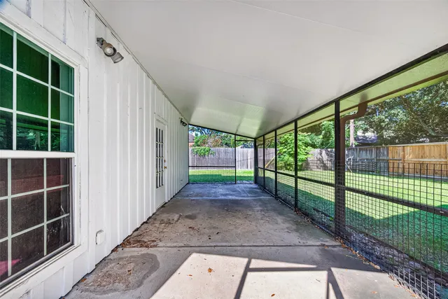 a view of a backyard with a large window