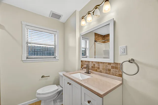 a bathroom with a shower and a bathtub