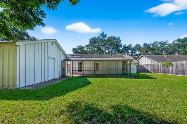 a view of a yard in front of a house