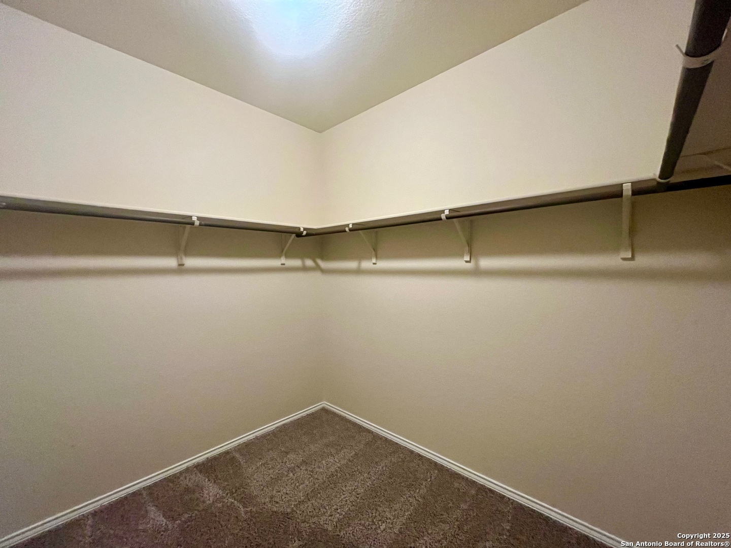 4330 Brigadier Drive Converse, TX 78109 - Photo 11 of 21 a view of a room with racks on the wall