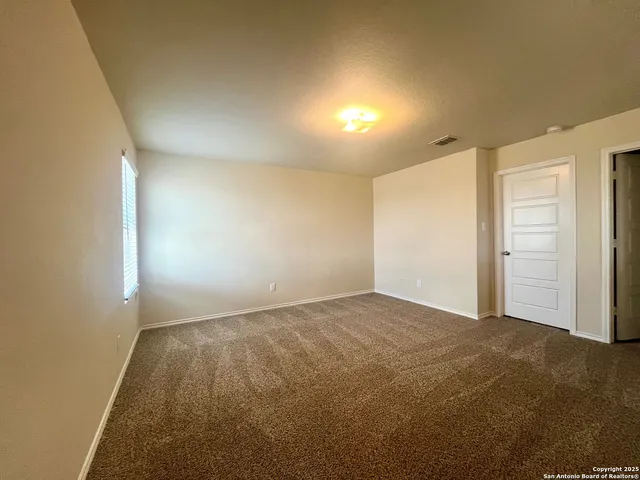 an empty room with an entryway