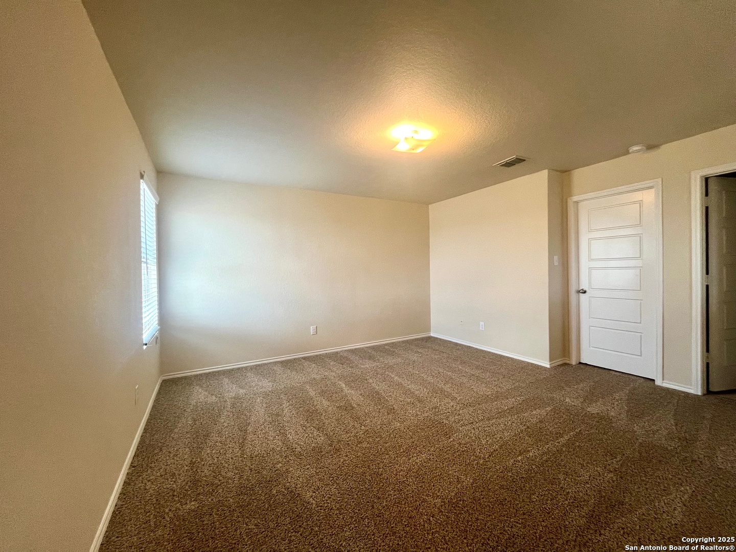4330 Brigadier Drive Converse, TX 78109 - Photo 12 of 21 an empty room with an entryway