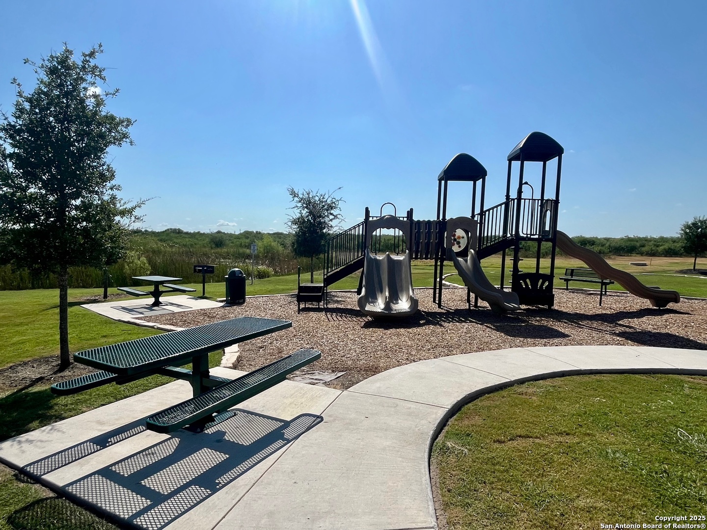 4330 Brigadier Drive Converse, TX 78109 - Photo 18 of 21 a view of a swimming pool with a lounge chairs