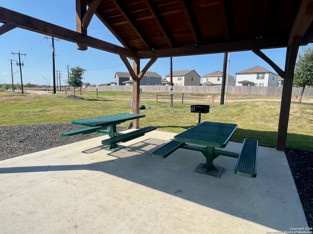a view of a swimming pool with a porch
