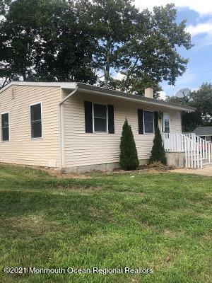 90 County Road Cliffwood, NJ 07721 - Photo 1 of 12 a view of a house with a yard